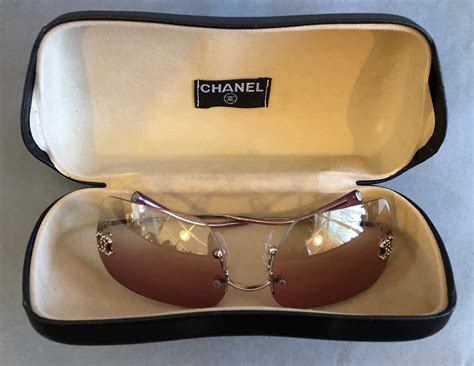 chanel vintage rimless cc sunglasses|chanel sunglasses pearl on side.